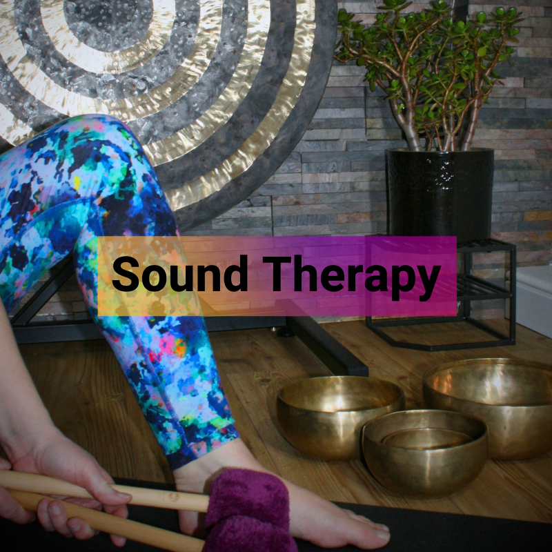 Sound therapy class set up, with Himalayan singing bowls and Sun gong, the title 'Sound Therapy' displayed over the centre of the photo